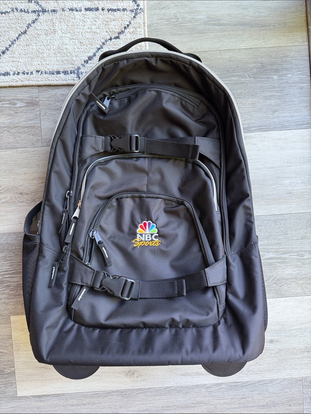 OGIO NBC Sports Logo Rolling Backpack Multi-Pocket Travel Bag
